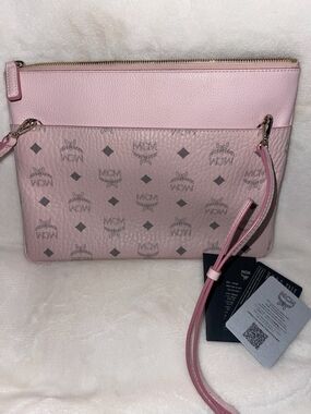 MCM Pink W Black Logo with Detachable Strap. 11.5L × 8.5H. Used 1 Time.